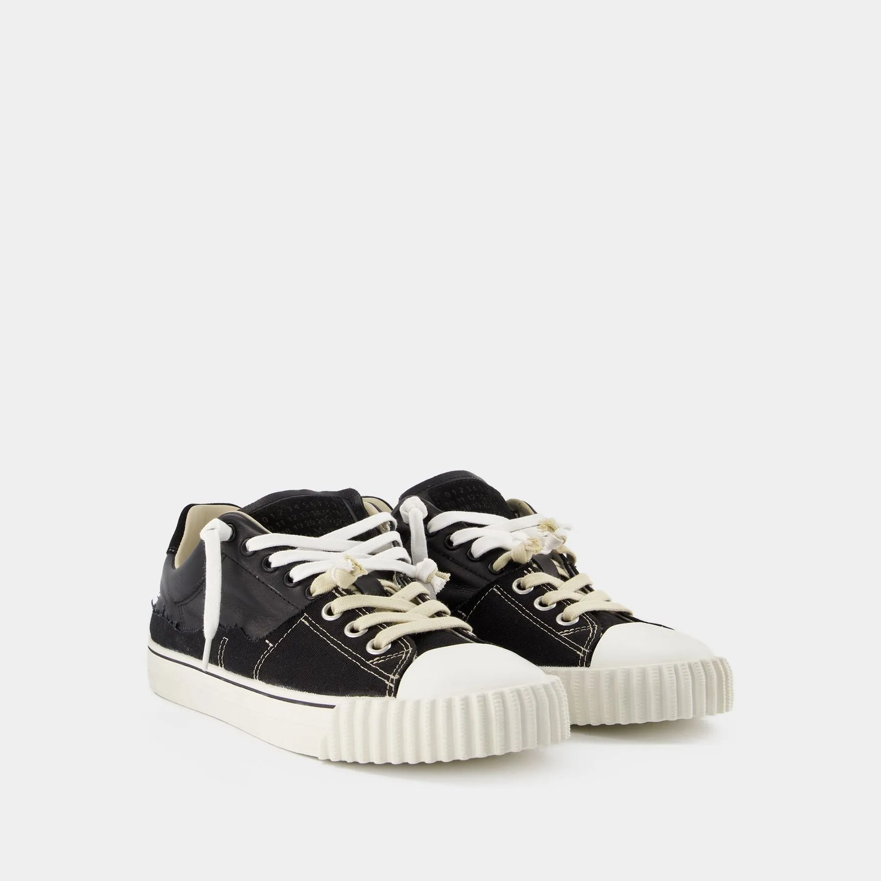 Replica Low Top Sneakers in Black Leather